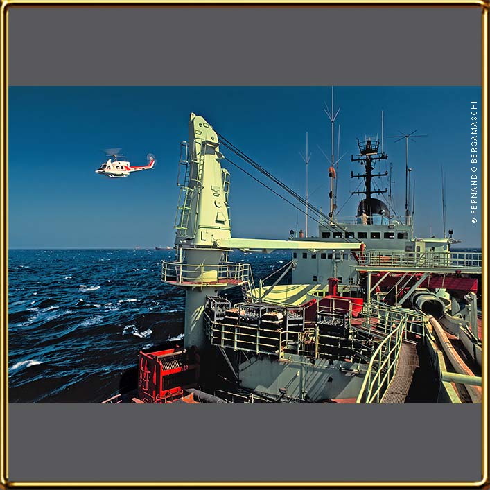 Helicopter to land on DSV ship in high seas, Bacia de Campos, Brazil.